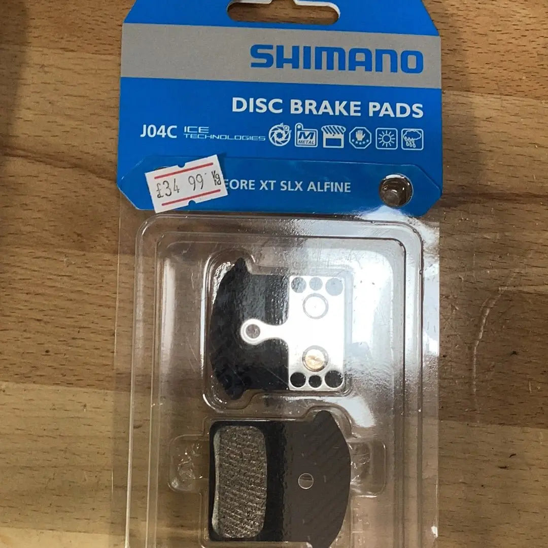 Shimano J04C disc brake pads and spring, cooling fins, alloy backed, sintered - Bike Clinique